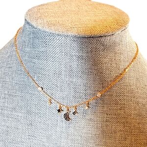 Swarovski moon and stars rose gold necklace